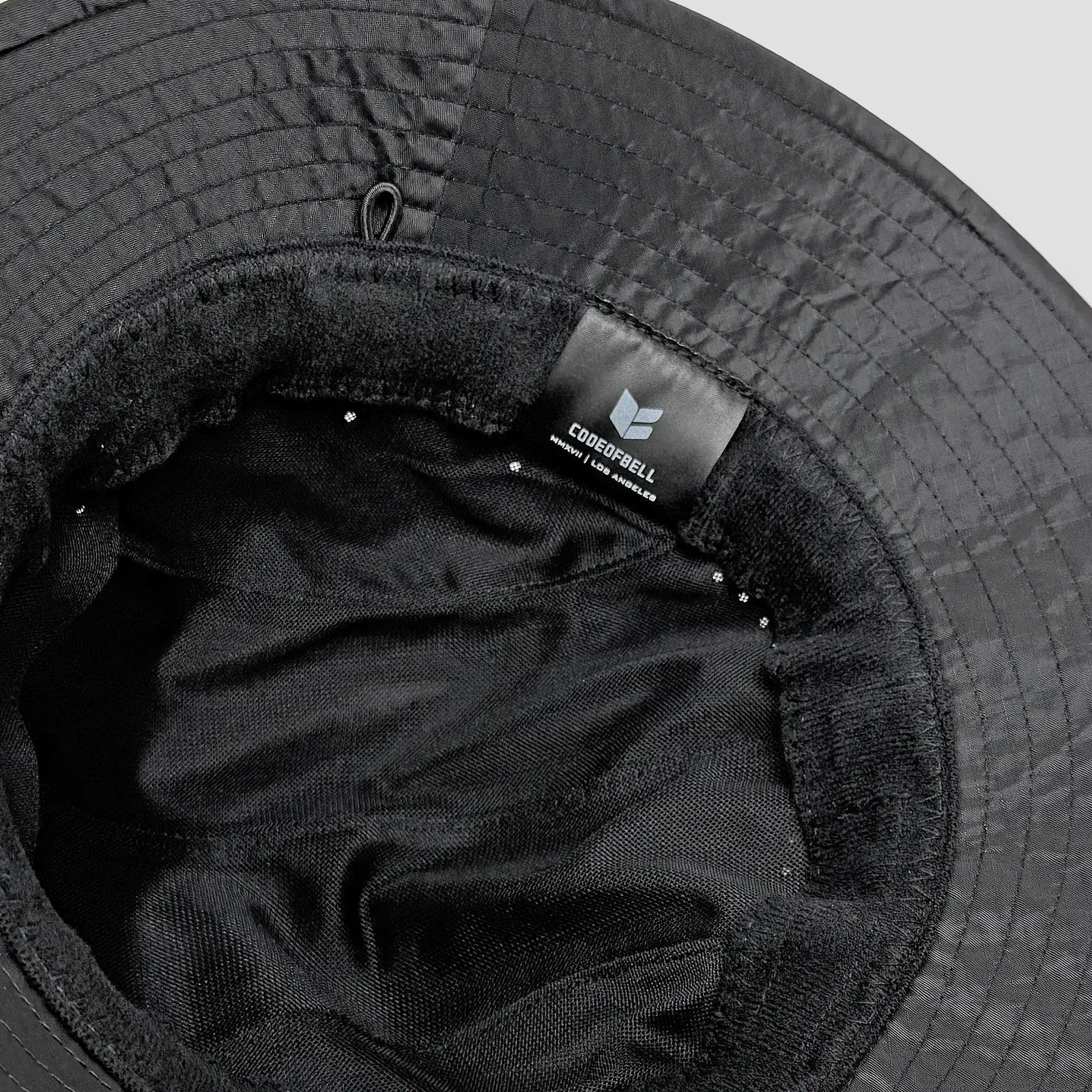 BASIX Rover Hat 後方反光織帶特寫，雙反光設計提升夜間安全