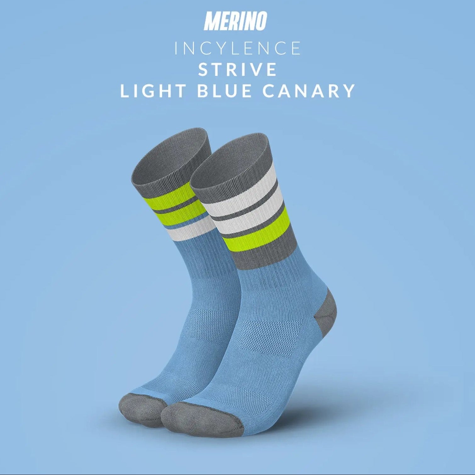 一雙 INCYLENCE Merino Strive 淺藍草綠羊毛運動機能襪，選用更高比例的 Merino 羊毛，著重於保暖與溫度穩定表現