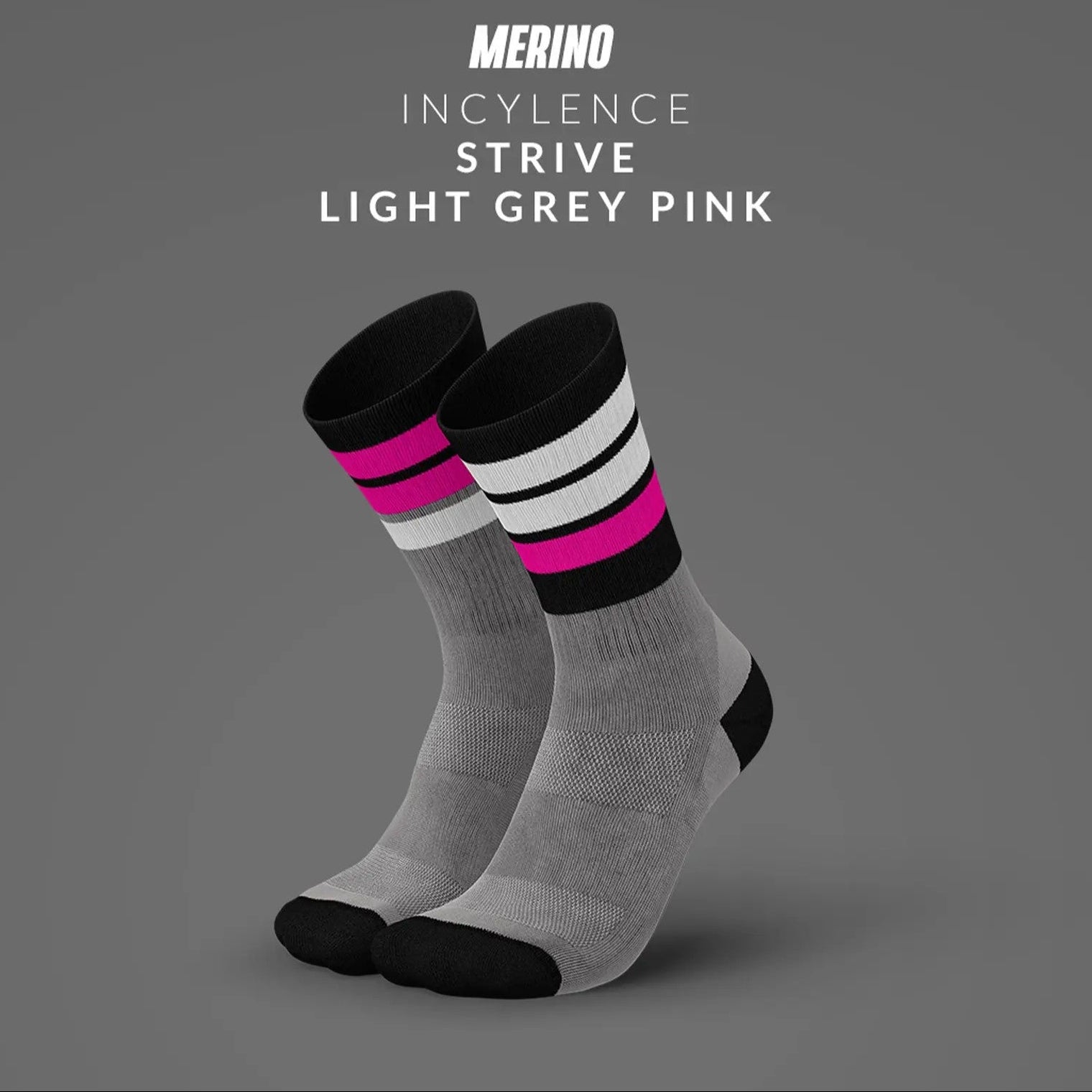一雙 INCYLENCE Merino Strive 灰桃紅羊毛運動機能襪，選用更高比例的 Merino 羊毛，著重於保暖與溫度穩定表現